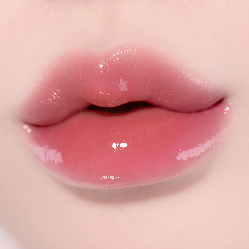 NATURE REPUBLIC Honey Melting Lip balm in a 2.7g container, offering nourishing hydration for soft, smooth lips.