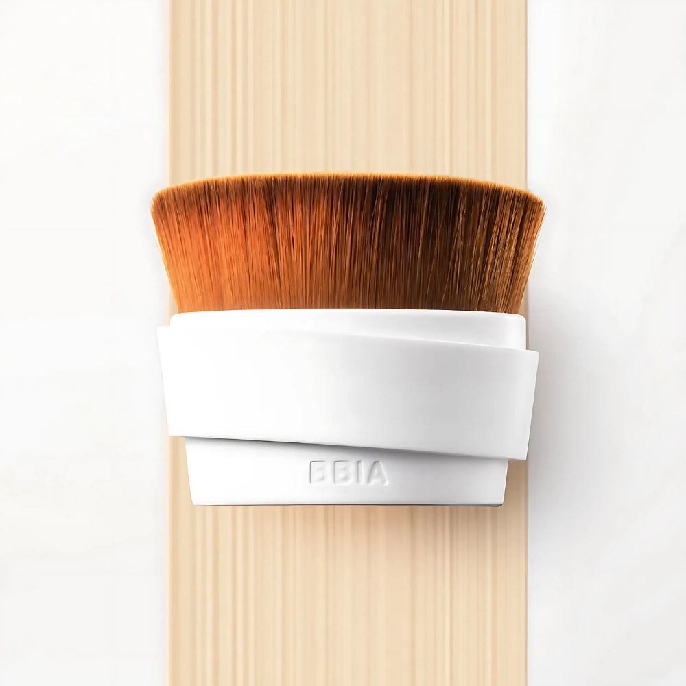 The brush's unique shape is crafted to reach every contour of your face, making it ideal for achieving both subtle and bold looks.