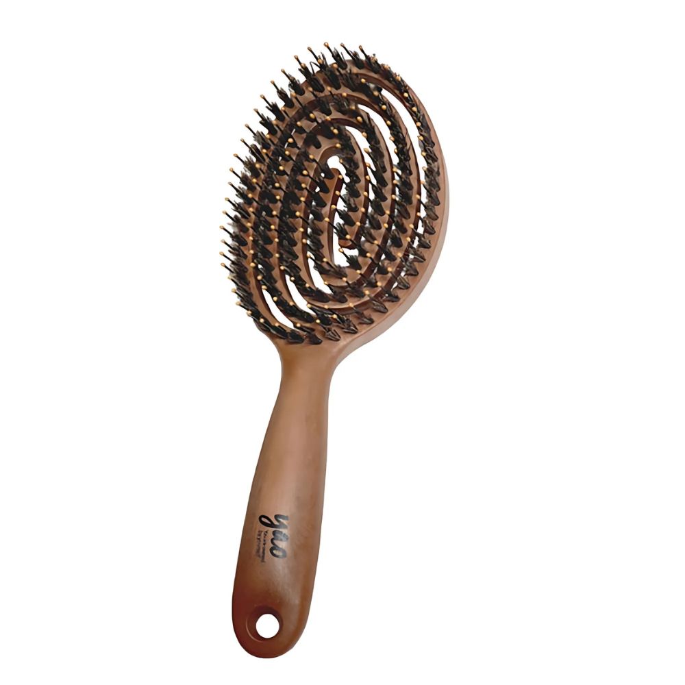 The yao Wood-like Round Boar Hair Brush is an essential styling tool designed to elevate your hair care routine.