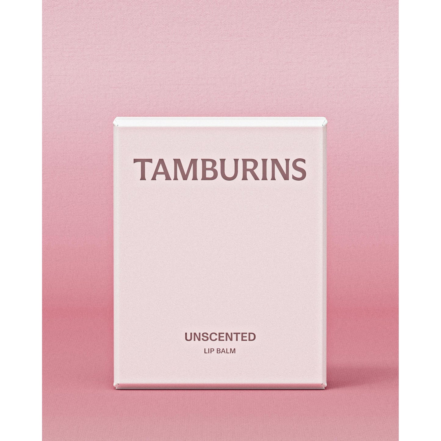 TAMBURINS Egg Lip Balm: A white egg-shaped container with the brand name 'tamburns of palermo' imprinted on it.