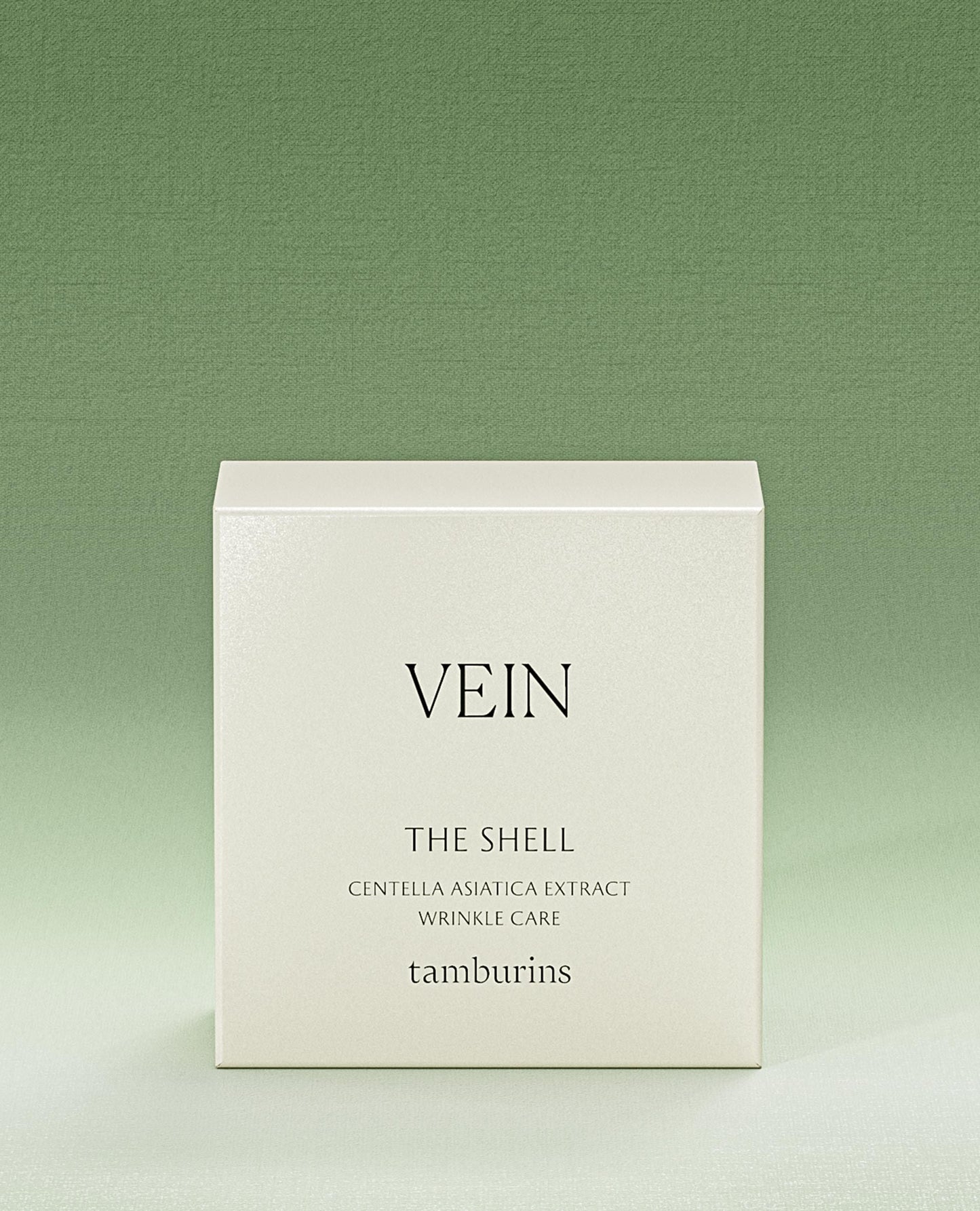TAMBURINS THE SHELL Perfume Hand 30ml in a white container with a cream-colored shell design. #VEIN