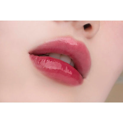 A vibrant TPSY Juicy Lip Plumper tube, 6g of lip-enhancing magic for a fuller, shinier pout.