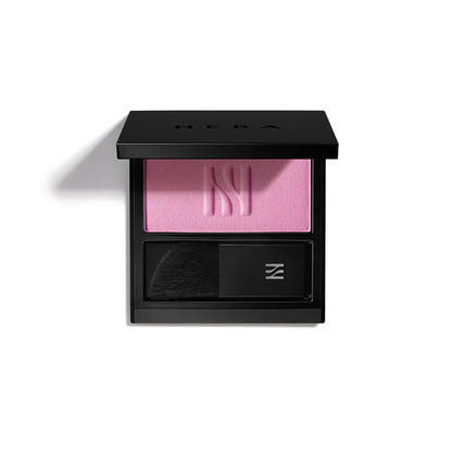 HERA Blush 5.5g, a compact blush that delivers a subtle pink tint, enhancing the cheeks with a natural glow.