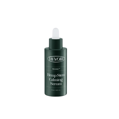 HEVOIR Hemp Stem Calming Serum 55ml bottle with green label and dropper, isolated on white background.