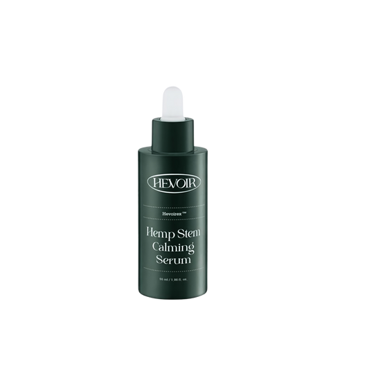 HEVOIR Hemp Stem Calming Serum 55ml bottle with green label and dropper, isolated on white background.