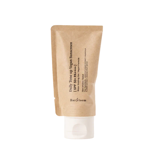 Herbloom Daily Tone up Vegan Sunscreen 50ml bottle with green label and white cap.