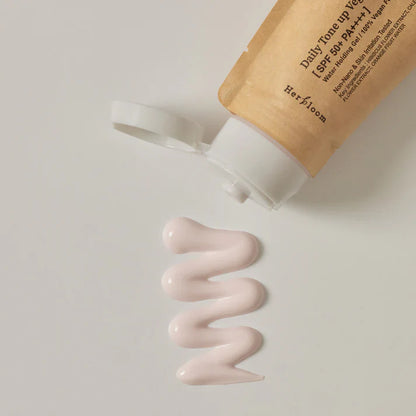 50ml bottle of Herbloom Daily Tone Up Vegan Sunscreen, designed to improve skin tone while offering reliable sun protection.