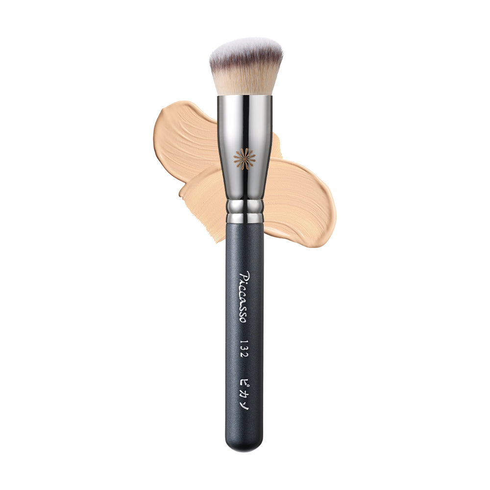 The PICCASSO 132 Foundation Brush features synthetic bristles and a flat, tapered design for seamless foundation application.