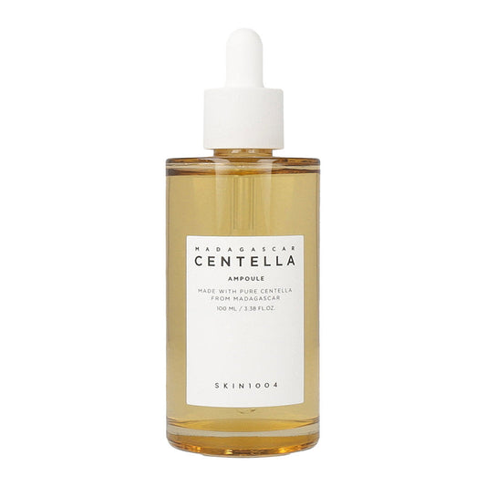 A 100ml bottle of SKIN1004 Madagascar Centella Ampoule, a skincare product known for its soothing and healing properties.