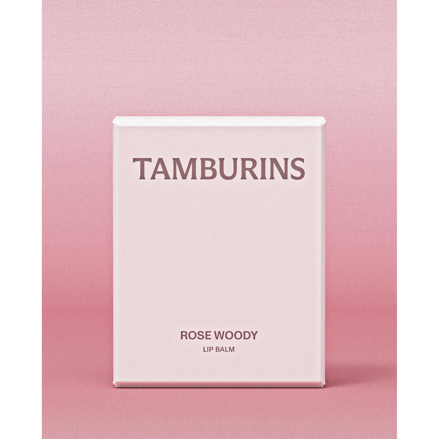 Tamburins pink lip balm: TAMBURINS Egg Lip Balm in a cute pink shade, perfect for moisturizing and protecting your lips.