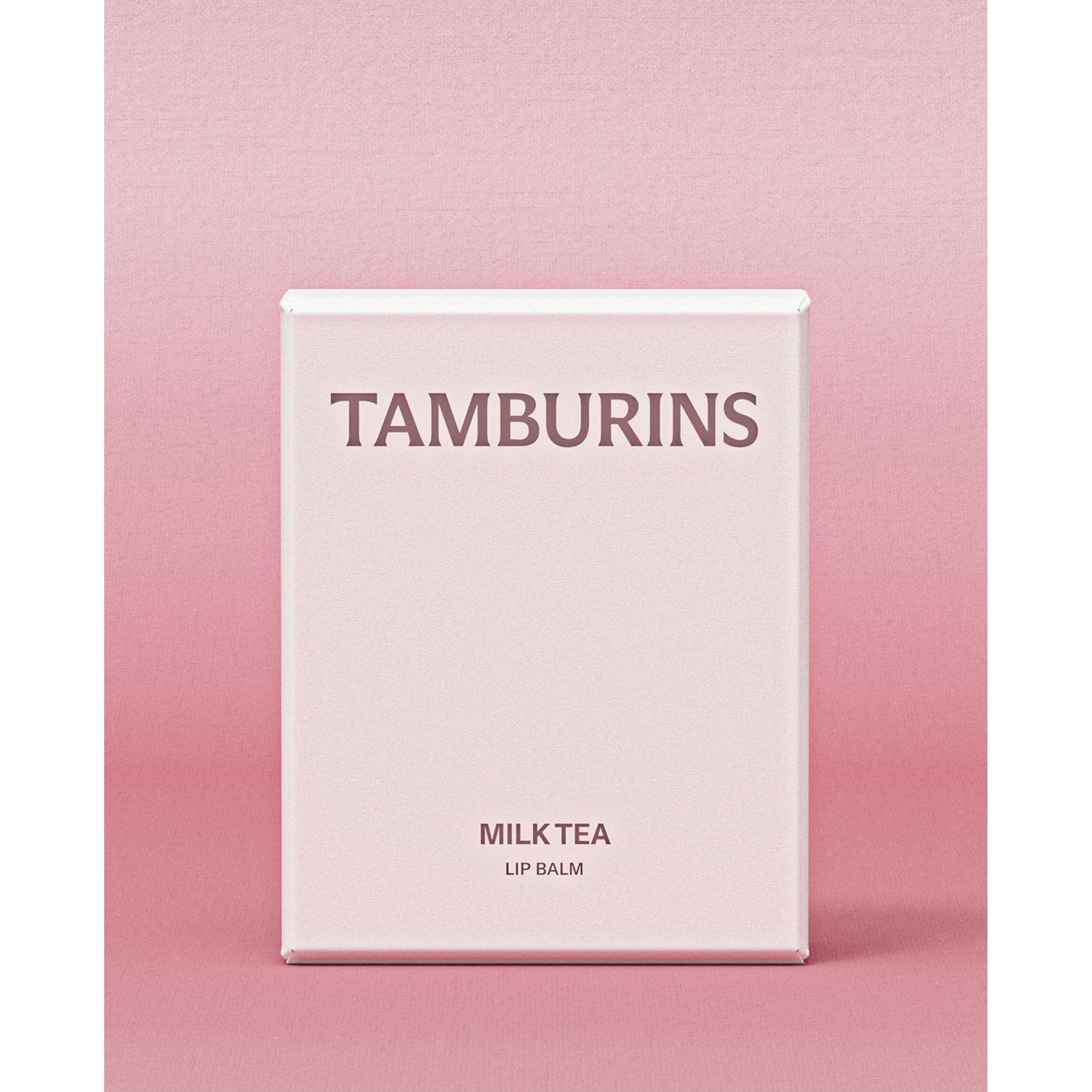 Get your lips feeling smooth and hydrated with TAMBURINS Egg Lip Balm, neatly packaged in a white container.