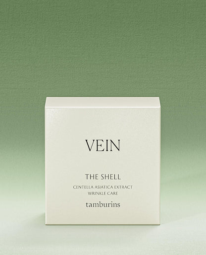 TAMBURINS THE SHELL Perfume Hand 30ml in a white container with a cream-colored shell design. #VEIN