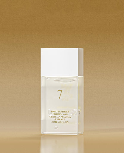 a bottle of perfume sitting on top of a table