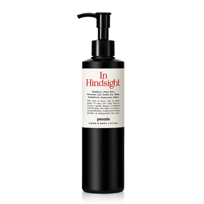 Hand and body lotion in a 250ml bottle, labeled "In Hindsight" by Pesade, designed for moisturizing and nourishing skin.